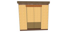 Tall wooden cabinet/armoire with beige textured panels, dark brown trim, and a small base drawer at the bottom.
